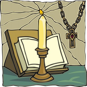 Bible with candle and cross